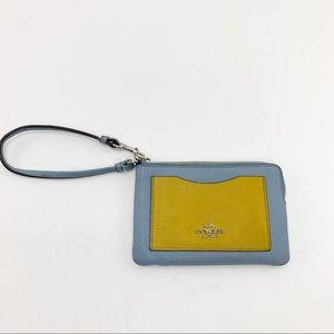 Coach baby blue and yellow leather wristlet